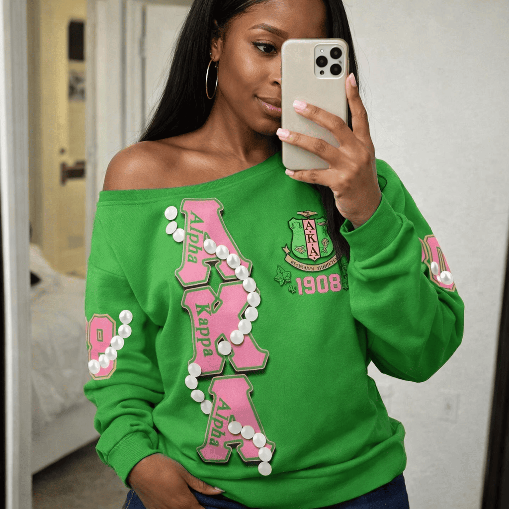 1908 Sisterhood Inspired Off Shoulder Sweatshirt – Pearl Chain + AKA Ivy Leaf Crest